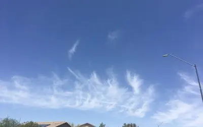Same sky, same time of day. First photo is Chemtrail in shy looking north. Second regular clouds in sky looking south. Arizona skies.
