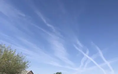 Marana Arizona. Chemical trails in sky.