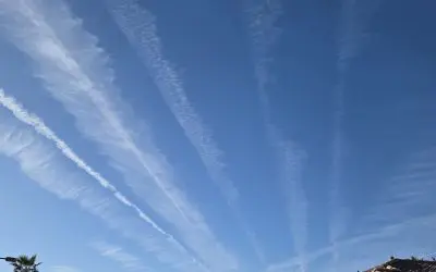 Checkboard Sky in Phx AZ – Seen 7 planes at once all spraying.  This corruption has to stop, somebody is getting paid to kill us!!